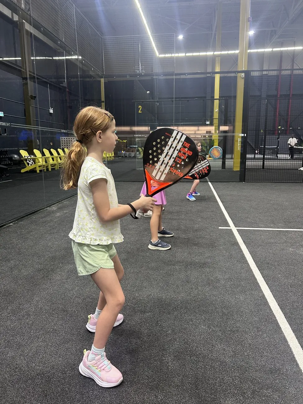 Junior player practicing padel