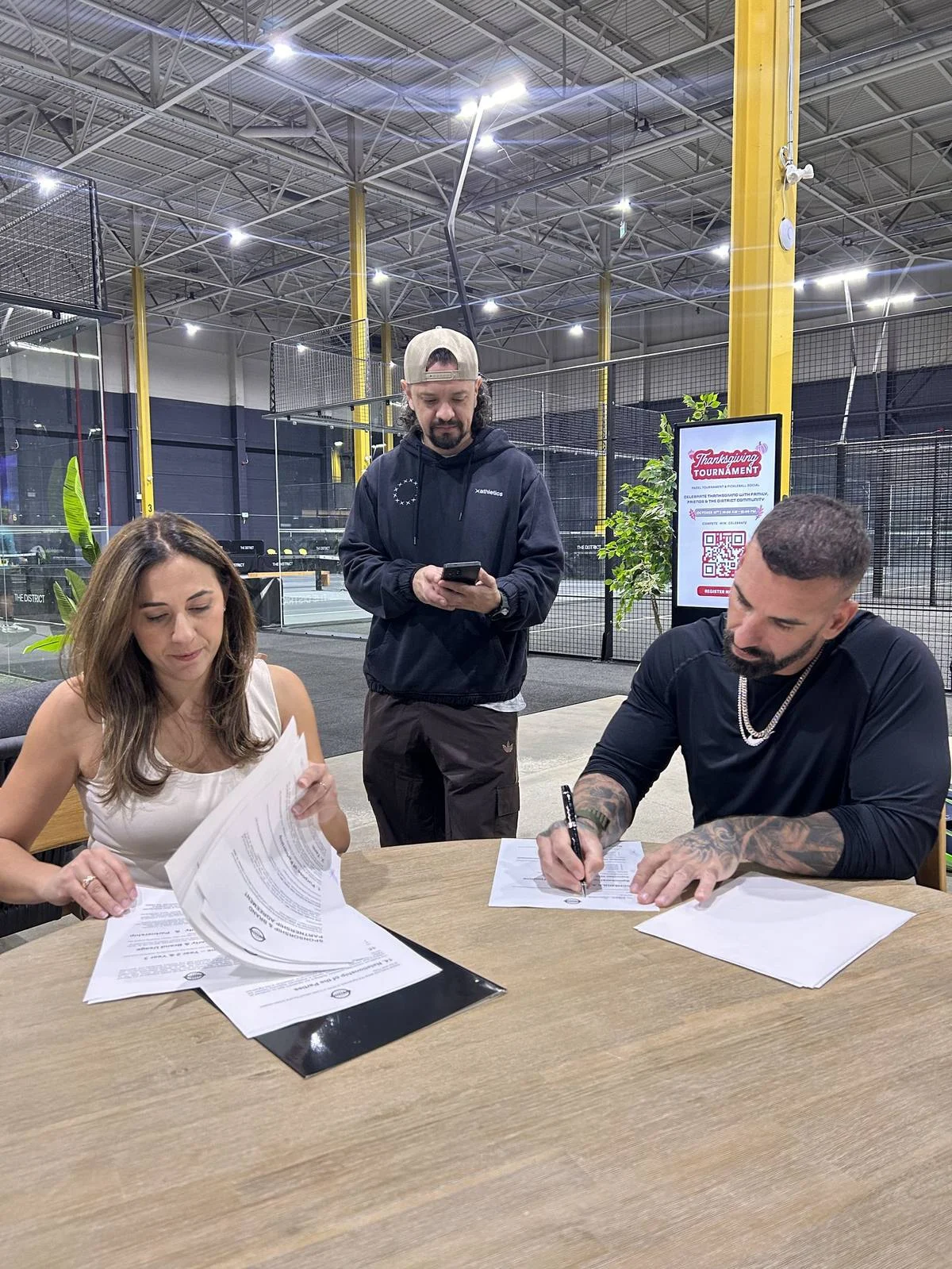 Signing the Sky Luxe sponsorship agreement at The District